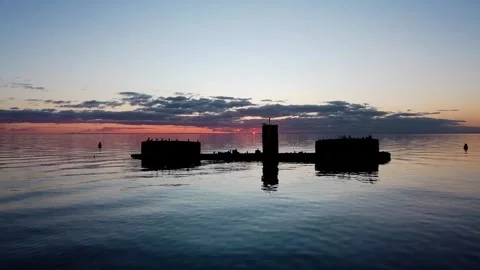 Birds on Ship Wreck at Sunset Stock Footage 286296399
