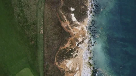 Birdseye View of Cliffs and Sea – HD Drone Forward Shot Stock Footage 319761685
