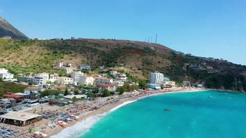 Birdseye view of Himara Beach and Adriatic Sea. Beautiful water Albania Riviera Stock Footage 159460212