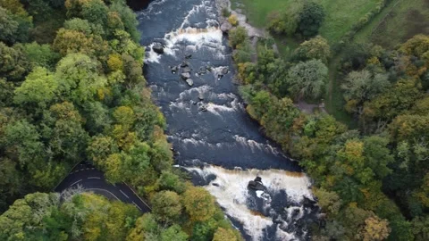 Birdseye. view over river rapids and waterfalls Stock Footage 292131916
