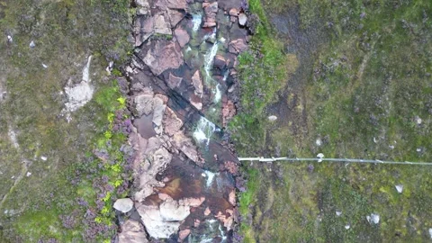Birdseye View of Stream Leading to Eas a’ Bhradain Waterfall in 4K Stock Footage 262004841