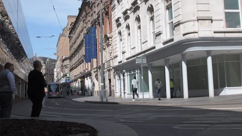 Birmingham, UK - May/17/2018: A Tram pulls up outside Grand Central Station. Stock-Footage 90119807