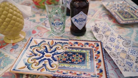 Birra Messina Beer Bottle Displayed Beside Sicilian Ceramic Tiles Stock Footage 341465539