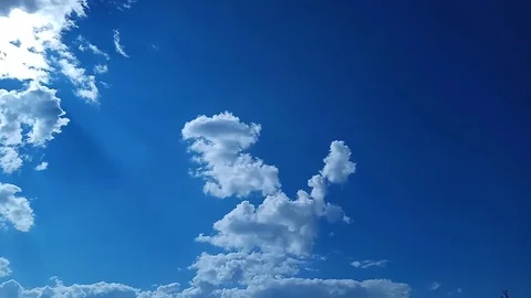 Birth of clouds in the blue sky. Timelapse. Stock Footage 77633476