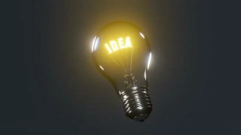 Birth of an idea in the glowing light bulb on the dark background. Stock Footage 149184175