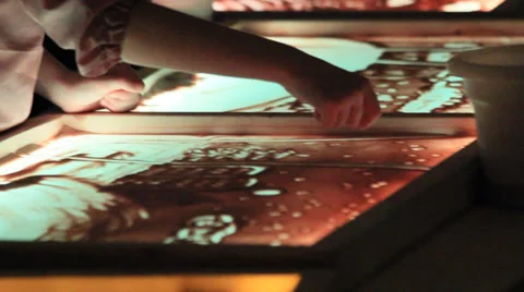 The birth of the paintings on the sand by human hands. A gift. The holiday. Stock Footage 33687757