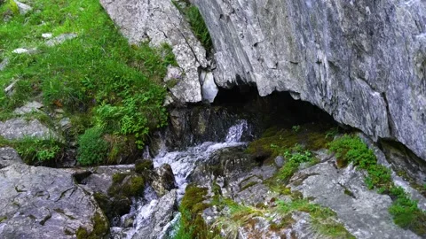 Birth of a river between the rocks Stock Footage 160334448