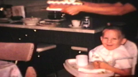 Birthday Boy Blows Out Candles-1965 Stock Footage