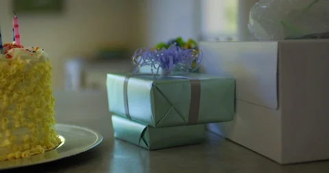 Birthday cake and presents on a table 스톡 동영상 88368502