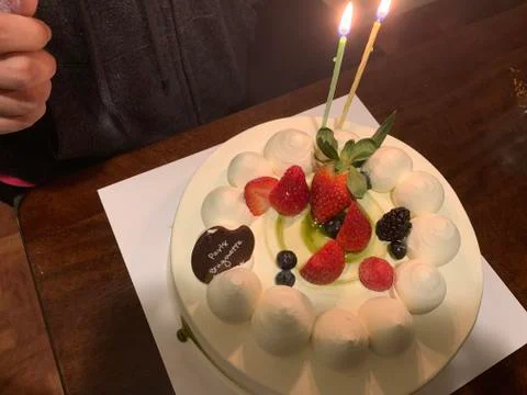 Birthday cake  with burning candles Stock Photos