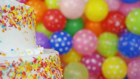 Birthday cake on colorful background | Stock Video | Pond5