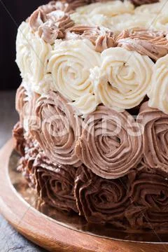Birthday Cake Decorated With Three Chocolate Cream Roses