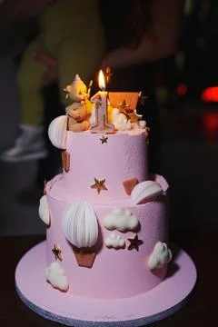Birthday cake with decorative elements for a first celebration Stock Photos