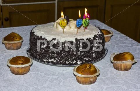 Birthday Cake With Four Candles Decorated With Banana And Chocolate Chips