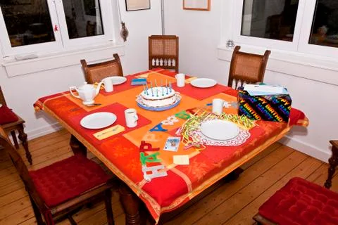 Birthday cake at the table Stock Photos