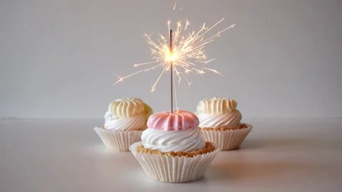 Birthday cupcake. Bengal fires or fireworks burn in the cake. Happy birthday Stock Footage