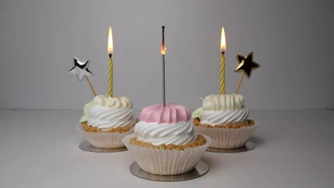 Birthday cupcake. Bengal fires or fireworks burn in the cake. Happy birthday Stock Footage