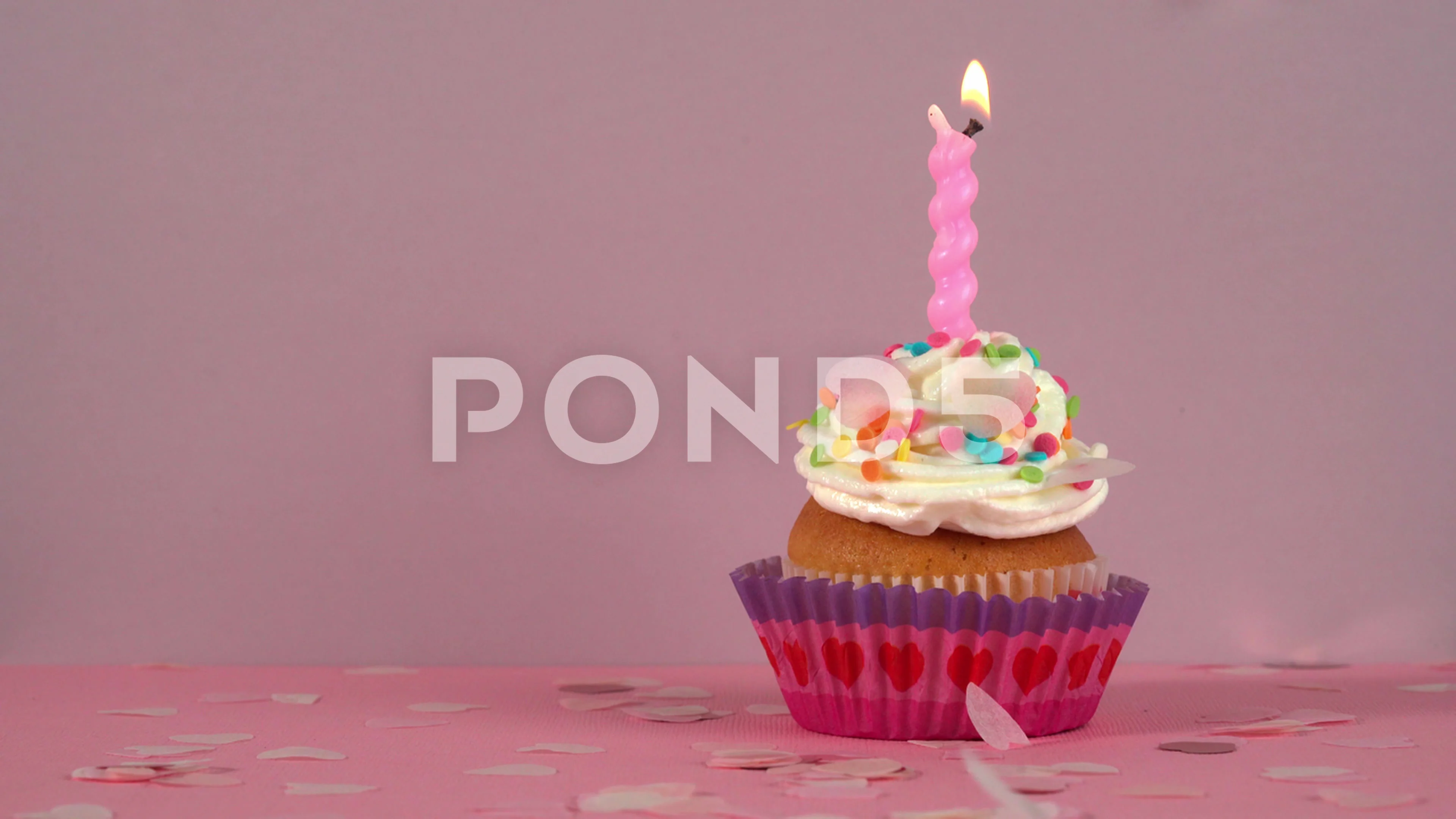 fancy birthday cupcake with candle