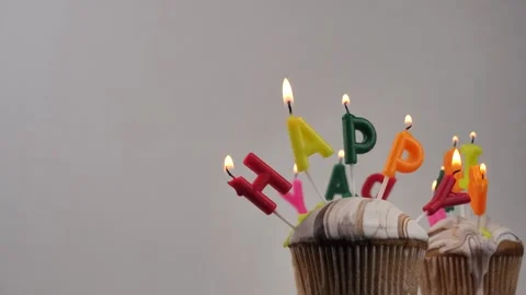 Birthday cupcake with candles on a light background. happy birthday concept Stock Footage 275910108