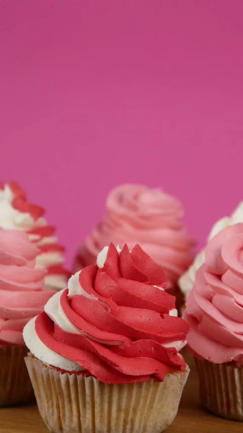 Birthday cupcakes rotate on a stand. Bright dessert for a children's birthday on Stock Footage 274498103