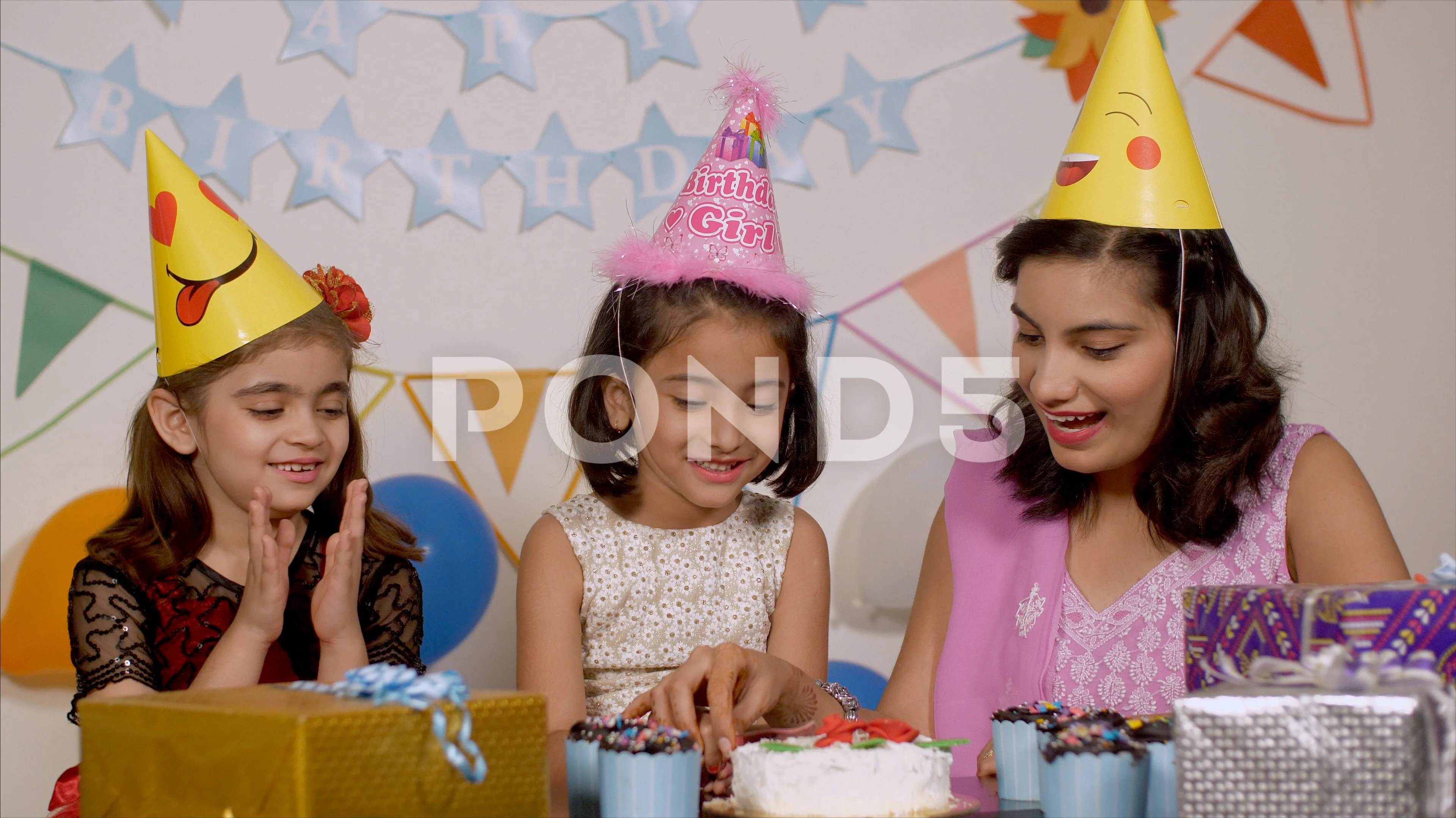 Abeka | Clip Art | Girl—cutting a birthday cake