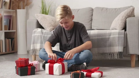 Birthday present excited boy festive inspiration Stock Footage 231056848