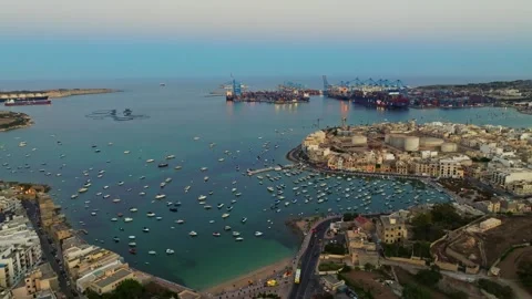 Birzebbuga, Malta - 07/07/2024: Evening drone view of city, boats, marina Stock Footage 278892722