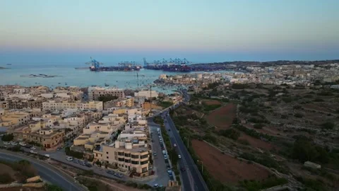 Birzebbuga, Malta - 07/07/2024: Sunset view of city. Port, boats, marina Stock Footage 278892727