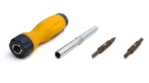 Bisassembled multi-bit screwdriver with replaceable bits on a white background Stock Photos
