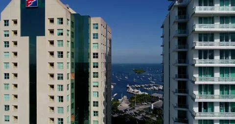 Biscayne Bay between the buildings in Coconut Grove Stock Footage 157391691