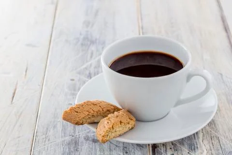 Biscotti and coffee Stock Photos