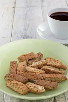 Biscotti on green plate Stock Photos