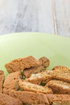 Biscotti on green plate Stock Photos