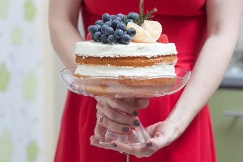 Biscuit cake with fruit hat Stock Photos