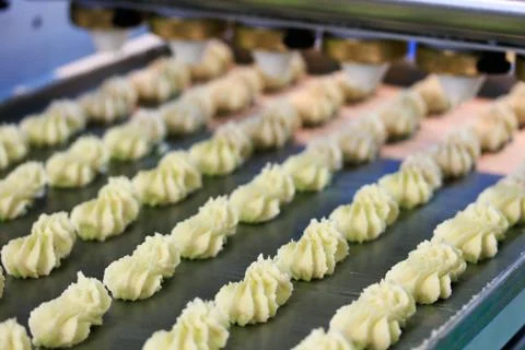 Biscuit cookies production process Stock Photos