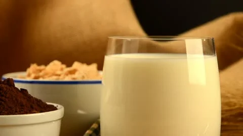 Biscuit dipped in milk Stock-Footage 12721462