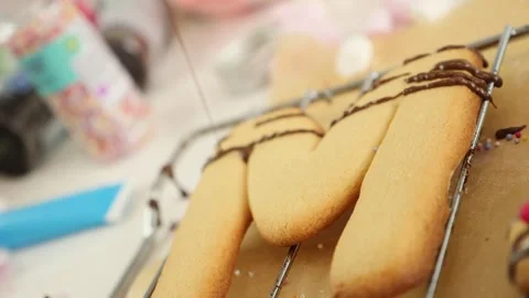 Biscuit poured with chocolate in slow motion Stock Footage 253610034