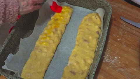 Biscuit preparations egg that is spread on the dough Video stock 242068116