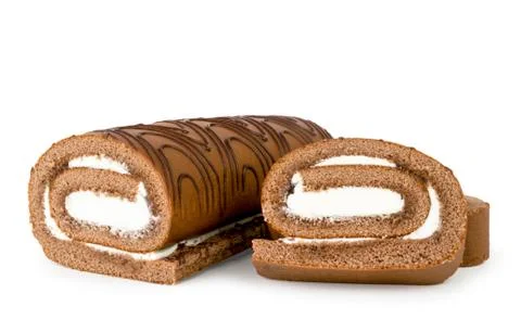 Biscuit roll with cream and two slices on a white. Isolated Stock Photos
