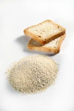 Biscuits and bread crumbs on white Stock Photos