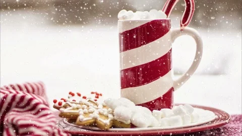 Biscuits and hot cup drink at christmas or xmas holidays under snowfall animatio Stock Footage 122138188