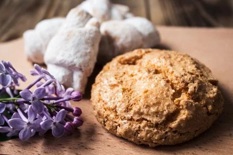 The biscuits and lilacs Stock Photos