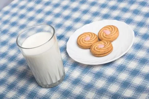 Biscuits and milk Stock Photos
