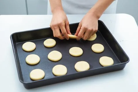 Biscuits on a baking sheet Stock Photos