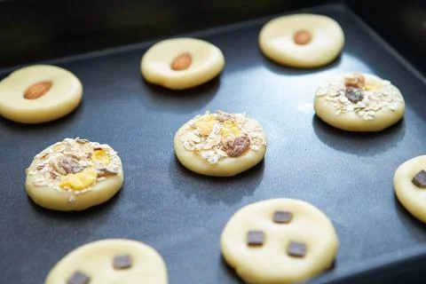 Biscuits on a baking sheet Stock Photos