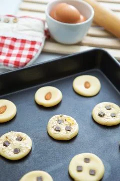 Biscuits on a baking sheet Stock Photos