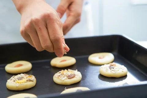 Biscuits on a baking sheet Stock Photos