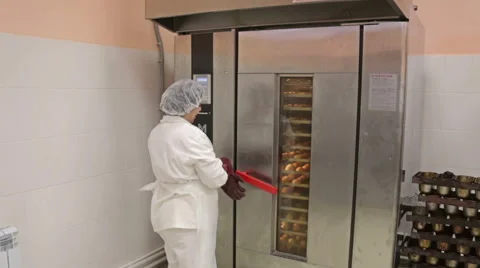 Biscuits being removed from the oven Stock Footage 51444736