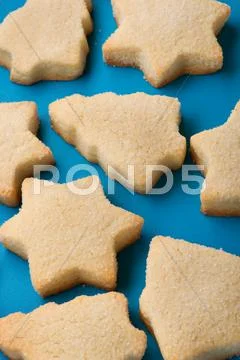 Biscuits on blue close up Stock Photos