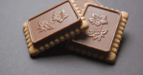 Biscuits with chocolate tablet rotating Stock Footage 242302020